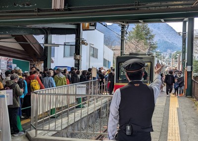 crowd exiting on right before new folks enter on left