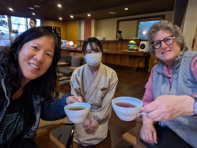 our hostess greets us with tea