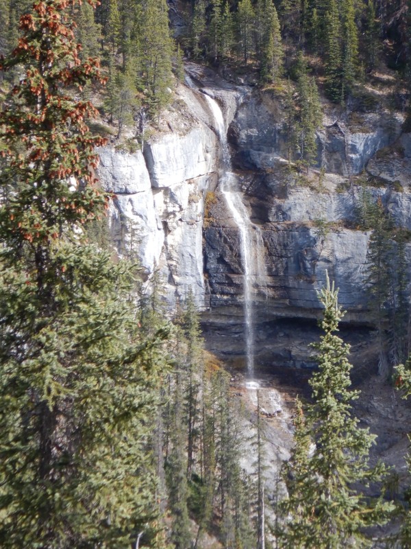 Bridalveil Falls; in 1931, the Canadian government commissioned the construction of a single-track road between Lake Louise and Jasper in the Great Depression as a relief project with the project completed in 1940