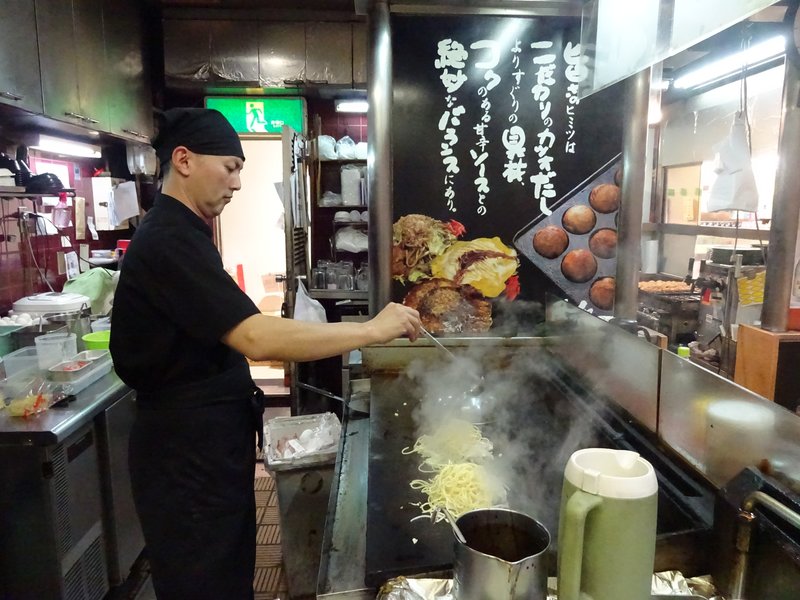 Cooking Okonomiyaki and Takoyaki, Japanese restaurant, Kyoto