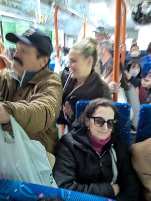 crowd hanging on during<br /> a turn by our crazy bus driver