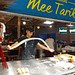 Preparing food on Jalan Alor, Kuala Lumpur.